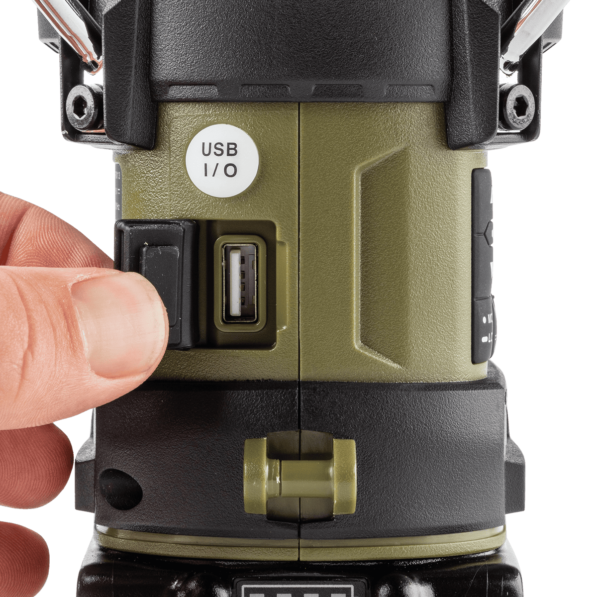 Close-up of the weather-sealed USB Type-A output port on the Makita ADRM13 lantern for charging smartphones and electronic devices.