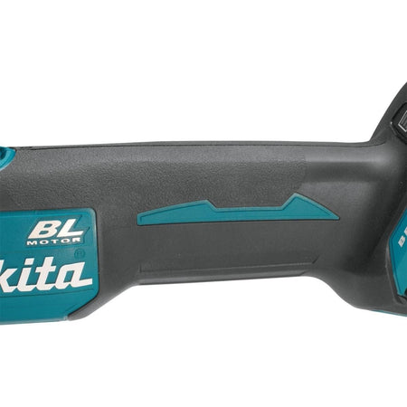 Close-up of the grinder's barrel grip showing the rubberized soft grip and teal accent panel for operator comfort.