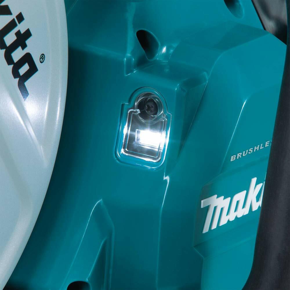 A close-up of the bright built-in LED light located near the cutting wheel of the Makita XEC01Z power cutter, shown illuminated.