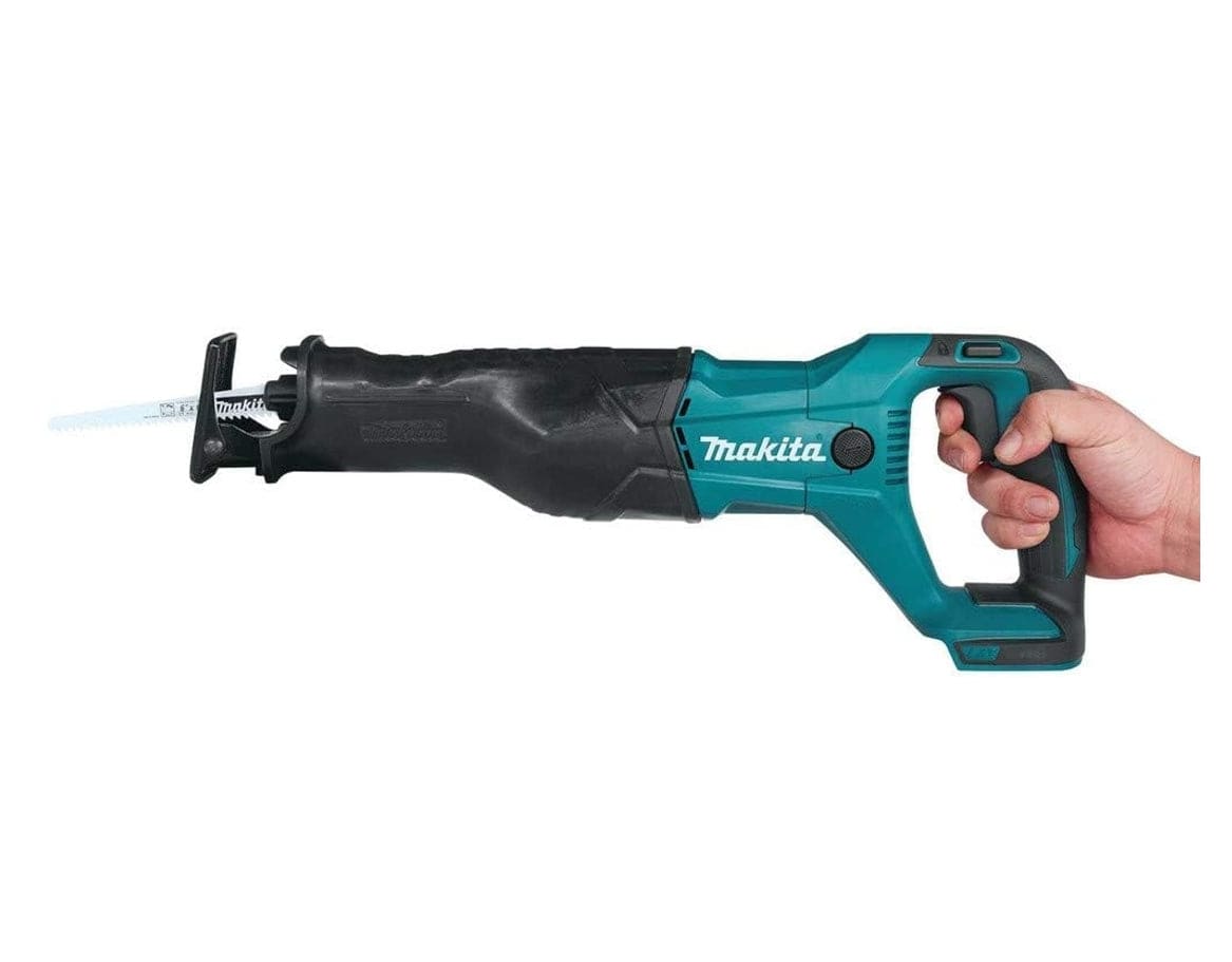 Side view of a hand gripping the handle of the cordless reciprocating saw to demonstrate the ergonomic design.