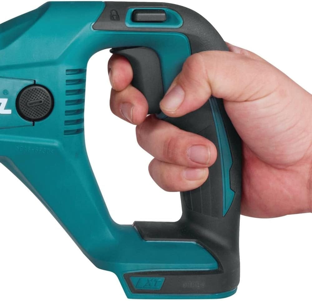 Close-up detail of a hand gripping the rubberized handle and pressing the large two-finger variable speed trigger.