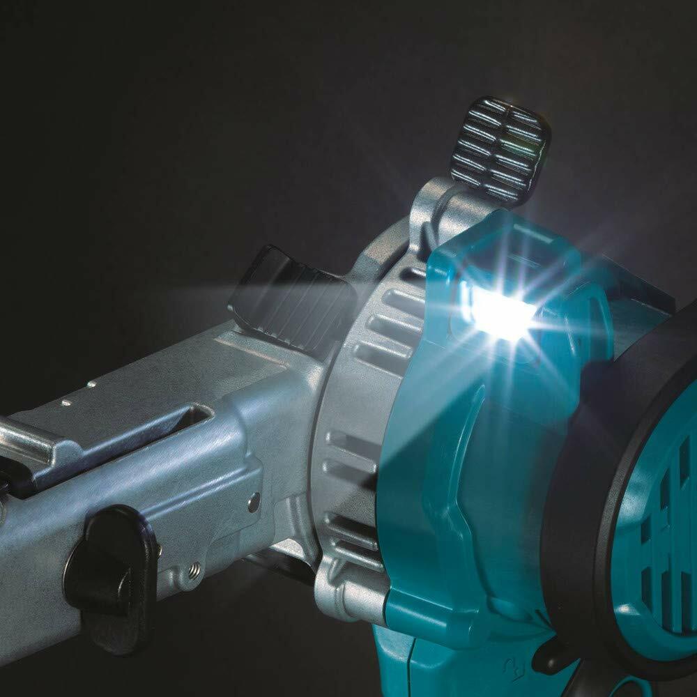 A close-up shot of the adjustable LED light on the Makita XSB01Z detail belt sander, shown brightly illuminated.