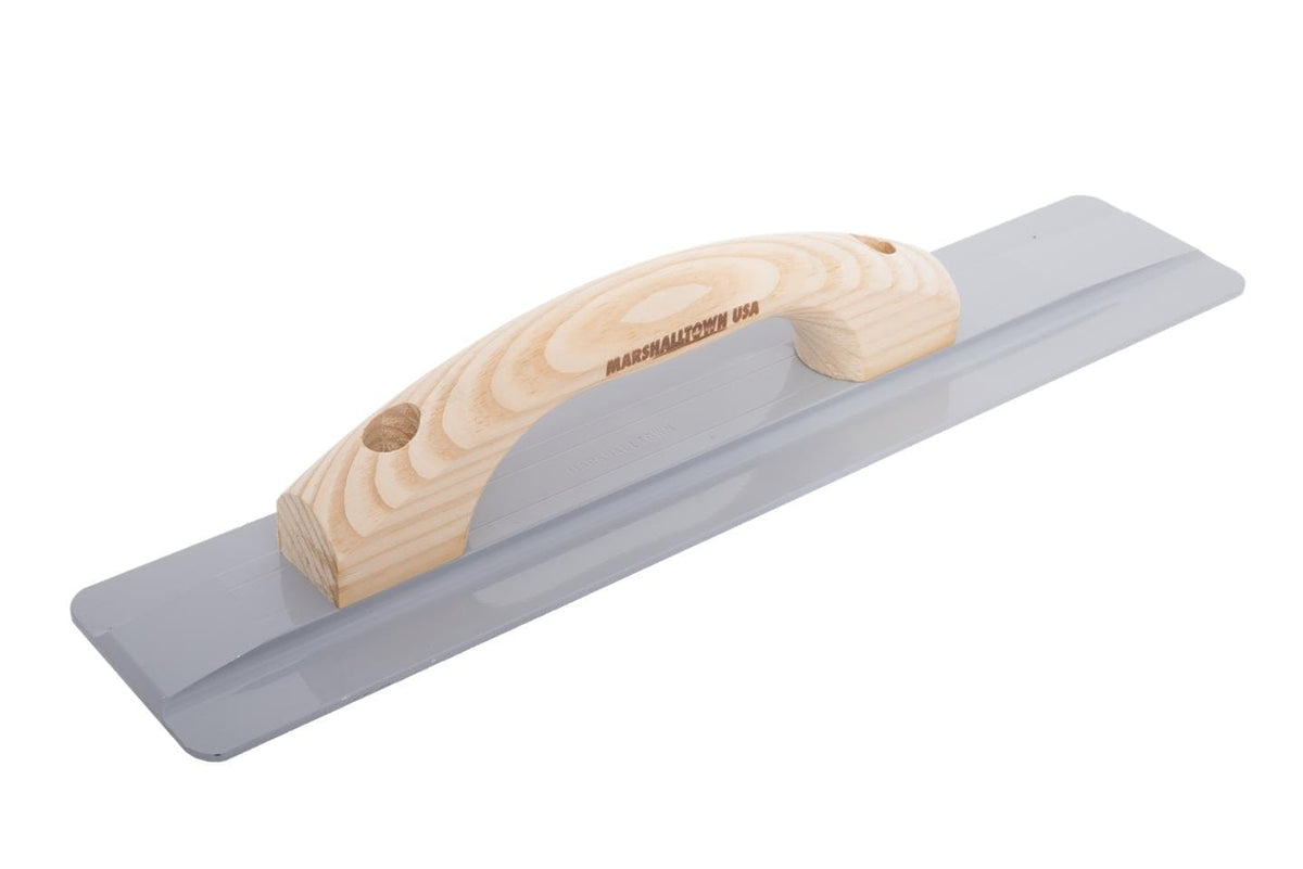 Angled top view of the Marshalltown float featuring a light wood handle branded with Marshalltown USA attached to the grey magnesium blade.