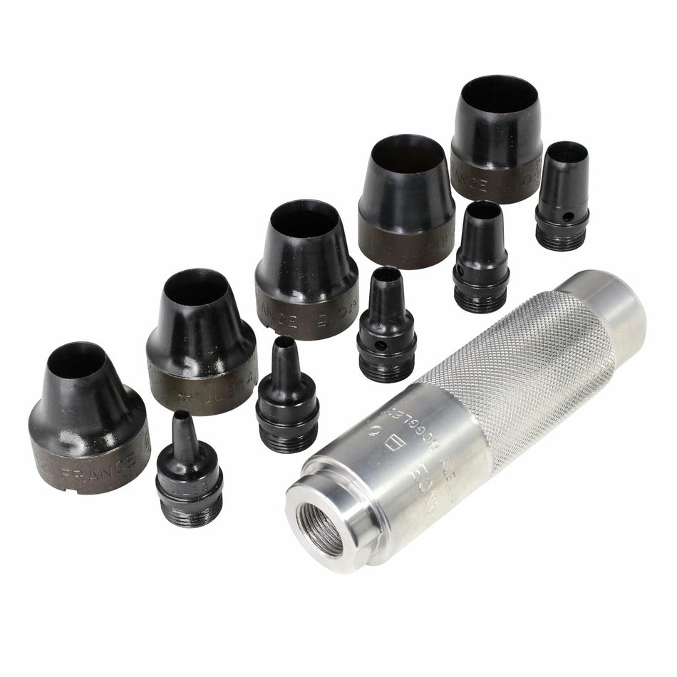 Set of metal valve guide driver tools with knurled handle and multiple threaded interchangeable heads. Each head is labeled with size markings. Designed for installing or removing valve guides in engine cylinder heads during automotive repair."