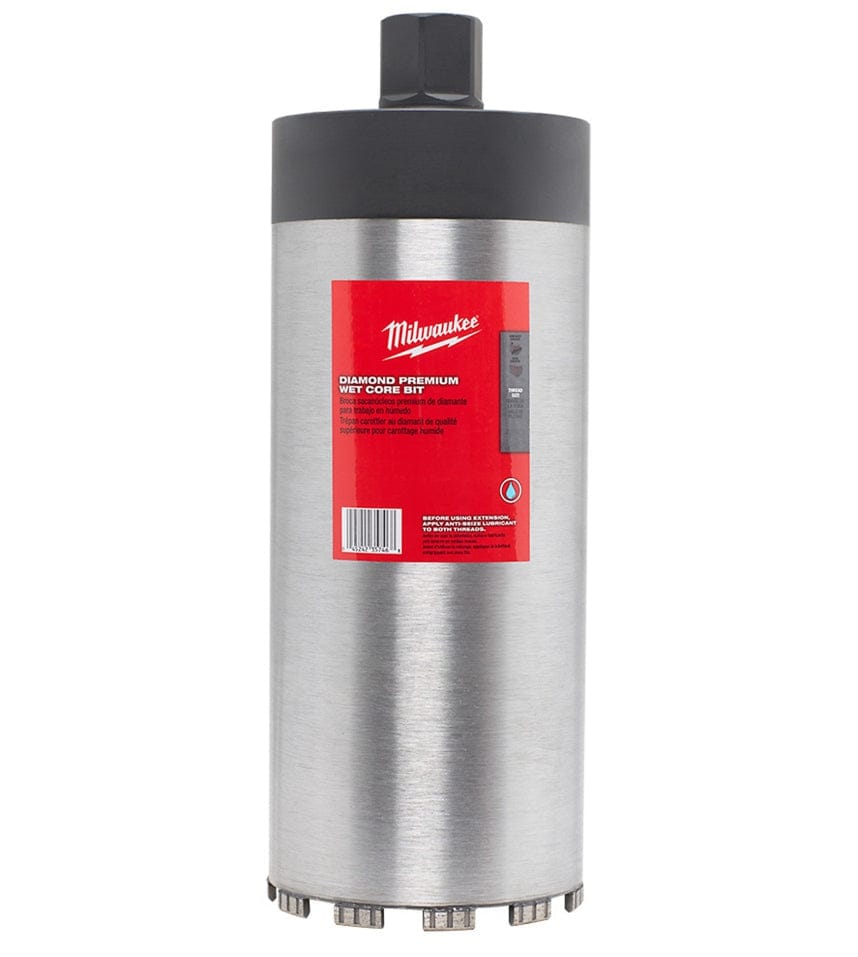 A studio product shot of the silver Milwaukee 48-17-3060 diamond wet core bit, featuring a red label and V-shaped turbo segments at the cutting edge for professional drilling into cured concrete and rebar.