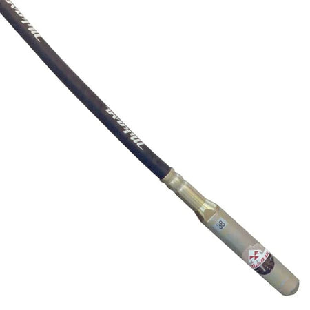 Close-up view focusing on the junction where the black flexible shaft connects to the silver metallic vibrator head.