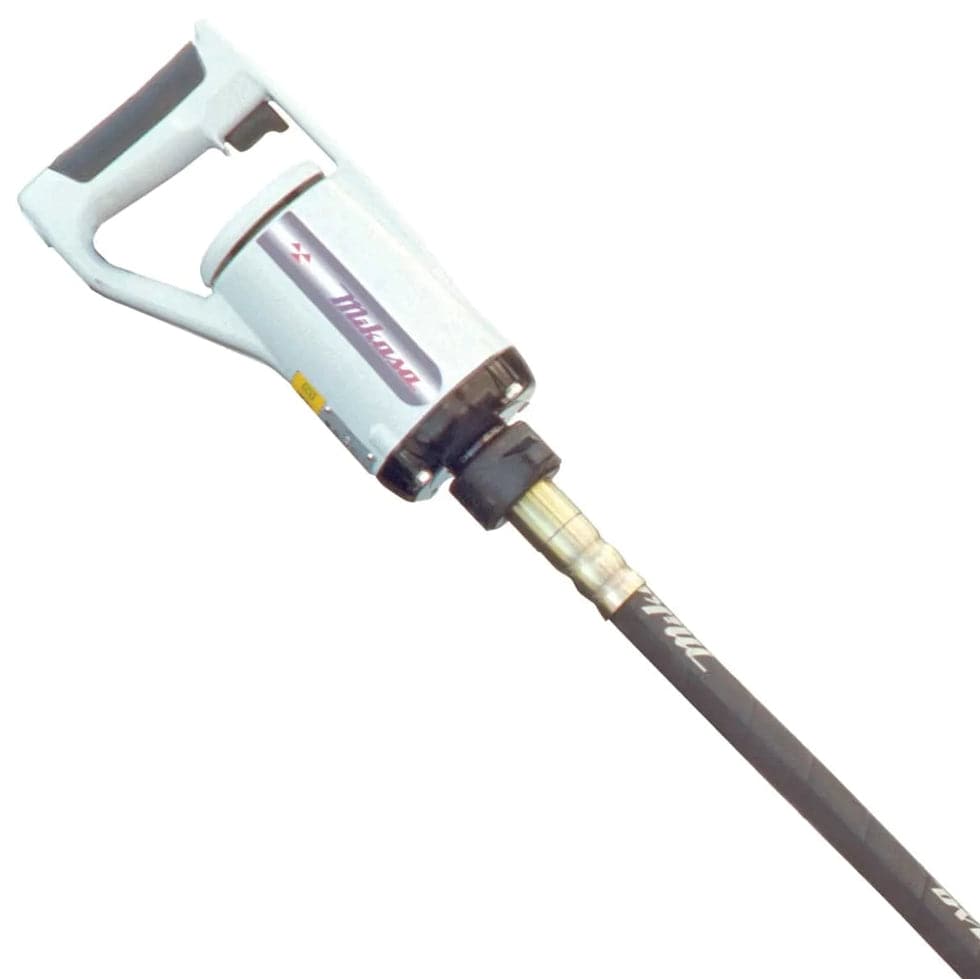 Close-up view of the handheld motor unit featuring a white casing, grey D-handle, and the connection point for the flexible shaft.