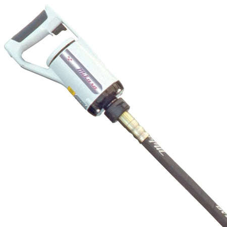 Close-up view of the handheld motor unit featuring a white casing, grey D-handle, and the connection point for the flexible shaft.