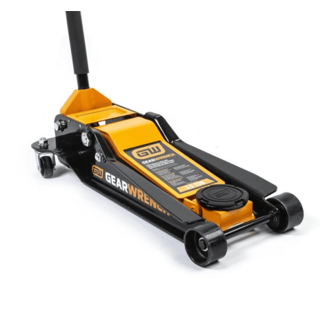 image 3.5 Ton Low Profile Floor Jack. 
The image shows a low-profile floor jack, primarily in black and orange, with the brand "Gearwrench" visible on its side and top. It has a long handle extending upwards from the rear, and four wheels, one at each corner of its rectangular base.
