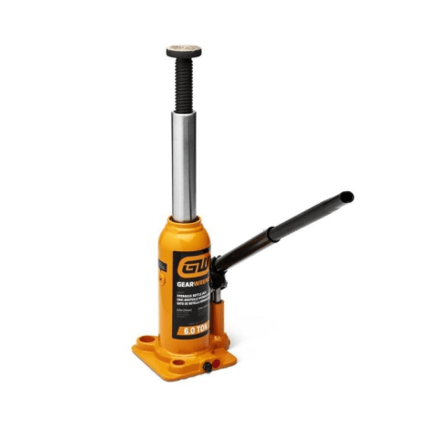 image of 6 Ton Hydraulic Bottle Jack fully extended.  This is an orange and black hydraulic bottle jack, a tool designed for lifting heavy objects, presented on a white background. It features a sturdy base, a tall, extendable silver ram with a textured black top, and a long black pump handle extended at an upward angle, with "GEARWRENCH 6.0 TON" branding visible on its side.