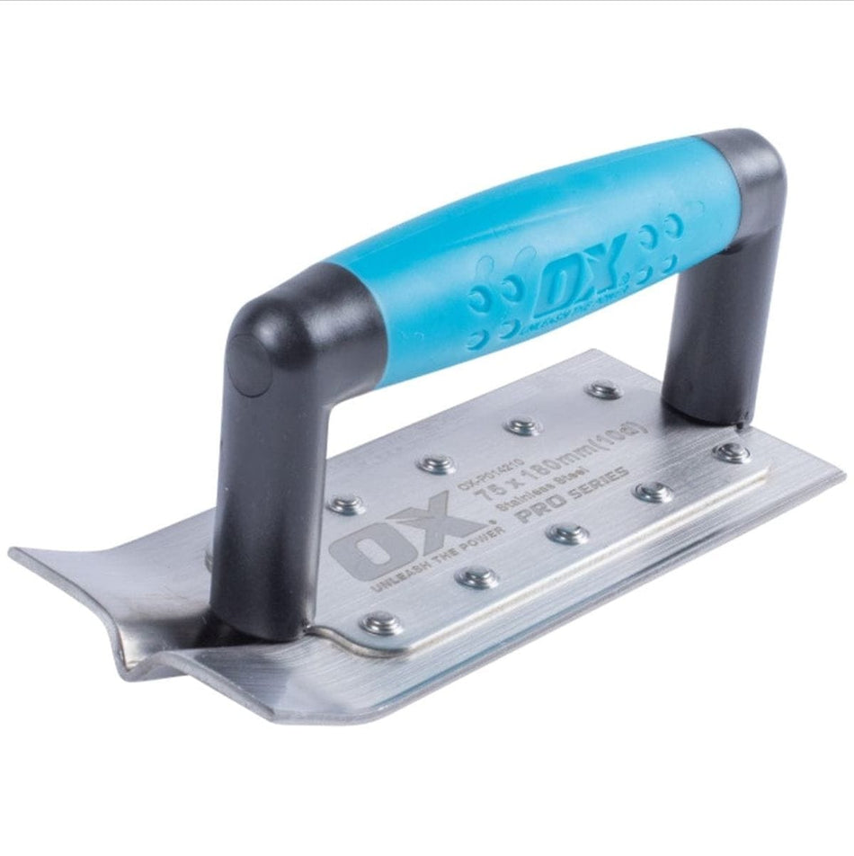 Studio view of the OX Tools Pro narrow concrete groover featuring a stainless steel blade and a blue and black soft grip handle.