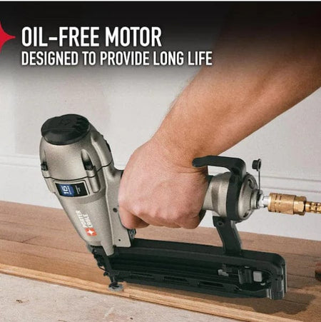 PORTER-CABLE pneumatic nailer in use on wood flooring, highlighting oil-free motor feature for reduced maintenance and extended tool life.