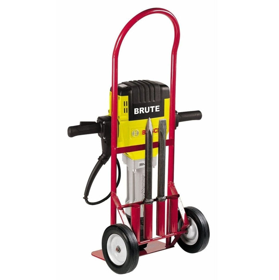 Bosch Brute jackhammer mounted on red hand truck with power cord and three chisel bits secured at the base for transport.