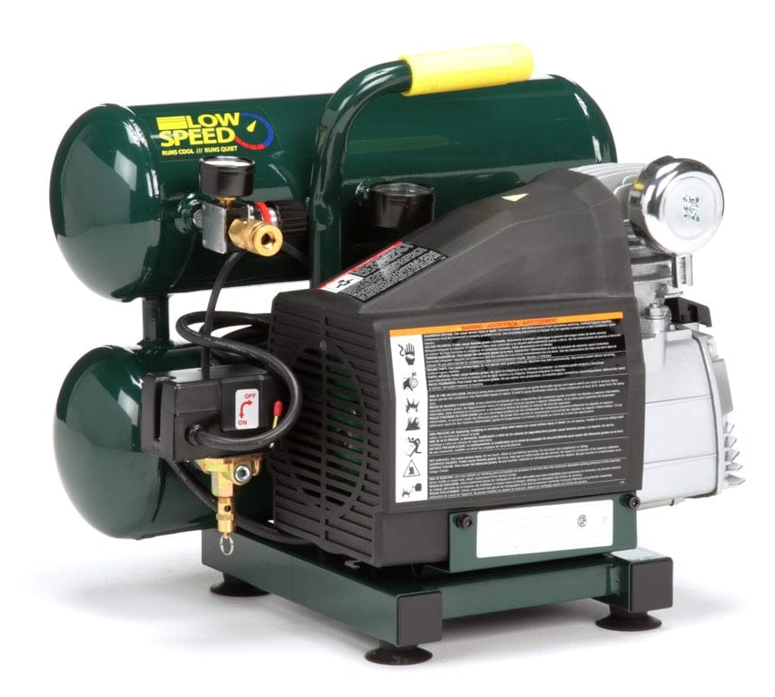 Angled view of the compressor showcasing the pump cover, the control panel, and the tank decal promoting the "LOW SPEED RUNS QUIET" feature