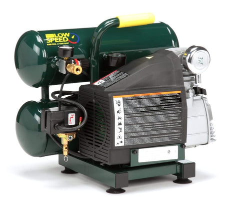 Angled view of the compressor showcasing the pump cover, the control panel, and the tank decal promoting the "LOW SPEED RUNS QUIET" feature