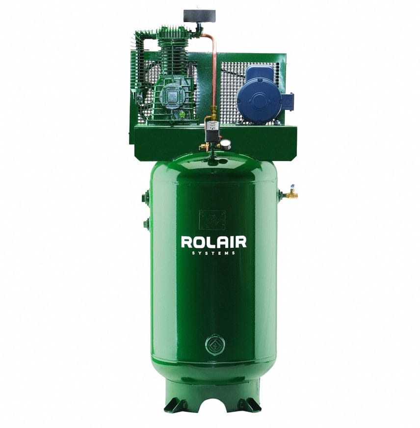  Rolair Systems air compressor. Based on its vertical tank and overall size, it very likely is the Rolair 5 HP Vertical 80 Gallon Air Compressor, as you suggested. You can see the "ROLAIR SYSTEMS" branding clearly on the tank.
