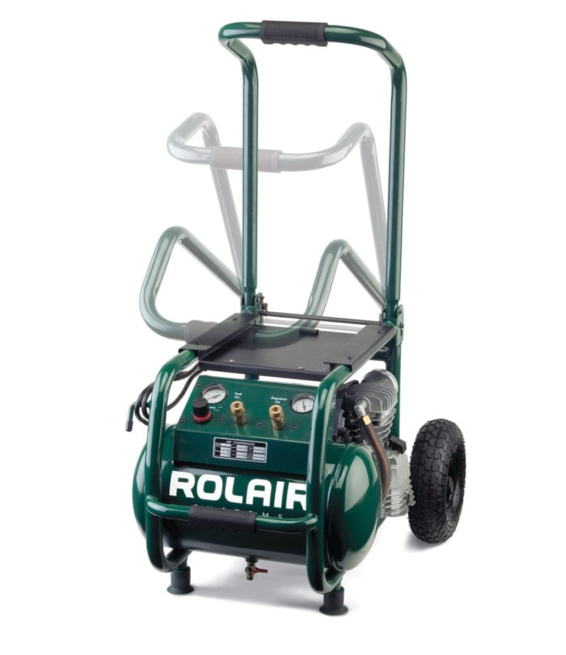 Front angled view of the Rolair VT25BIG portable compressor with the handle extended for transport, showing the dual gauges and quick-disconnect couplers on the control panel