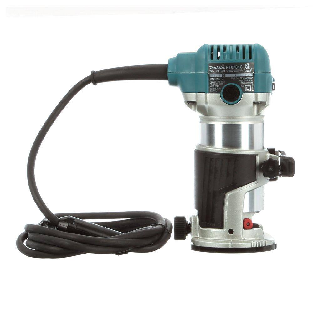 Rear view of the Makita 1-1/4 HP corded compact router displaying the black rubberized grip, heavy-duty power cord, and double insulated teal motor cap.