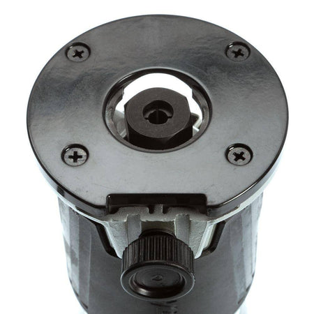 Underside view of the Makita RT0701C fixed base router showing the non-marring base insert designed to protect workpieces and the precise 1/4 inch collet for router bits.