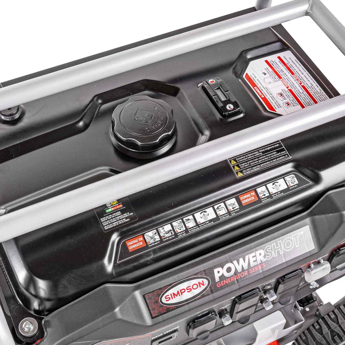 Top down view of the 6.6-gallon metal fuel tank showing the fuel gauge, gas cap, and operational warning labels.