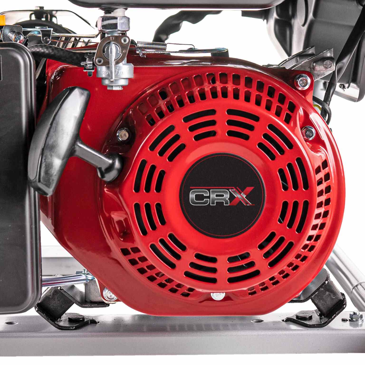 Close-up of the red CRX engine recoil starter assembly showing the cooling vents and pull handle.