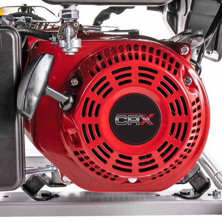 Close-up of the red CRX engine recoil starter assembly showing the cooling vents and pull handle.