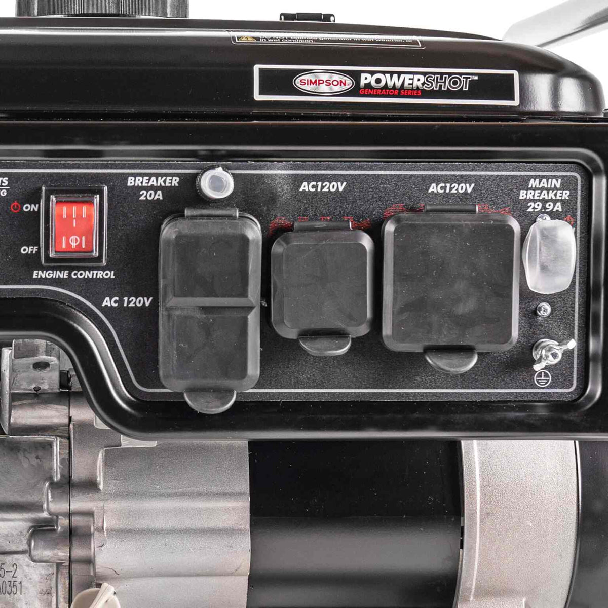 Close-up detail of the control panel featuring the engine switch, 20A circuit breakers, and covered 120V outlets.