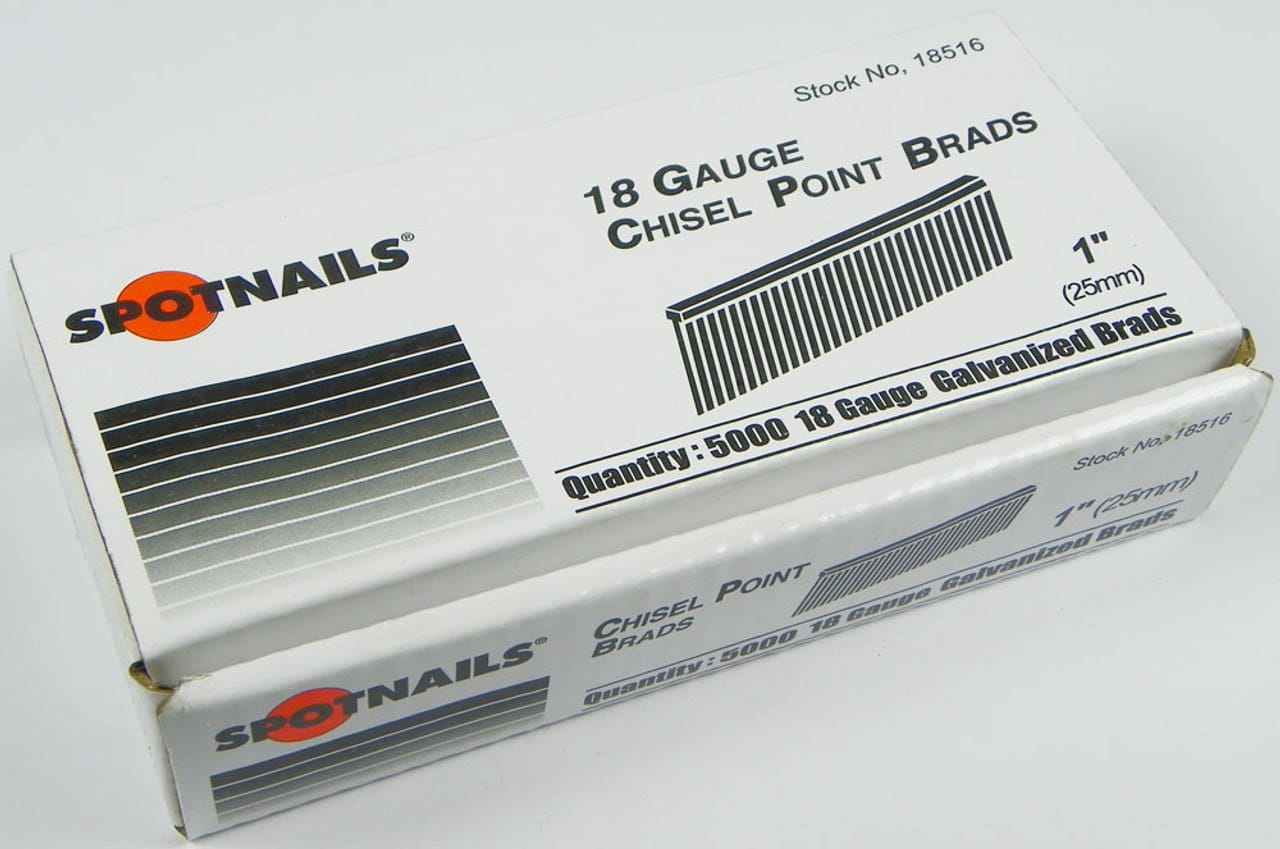 Box of Spotnails 18 gauge chisel point brads with nails in front on a white background
