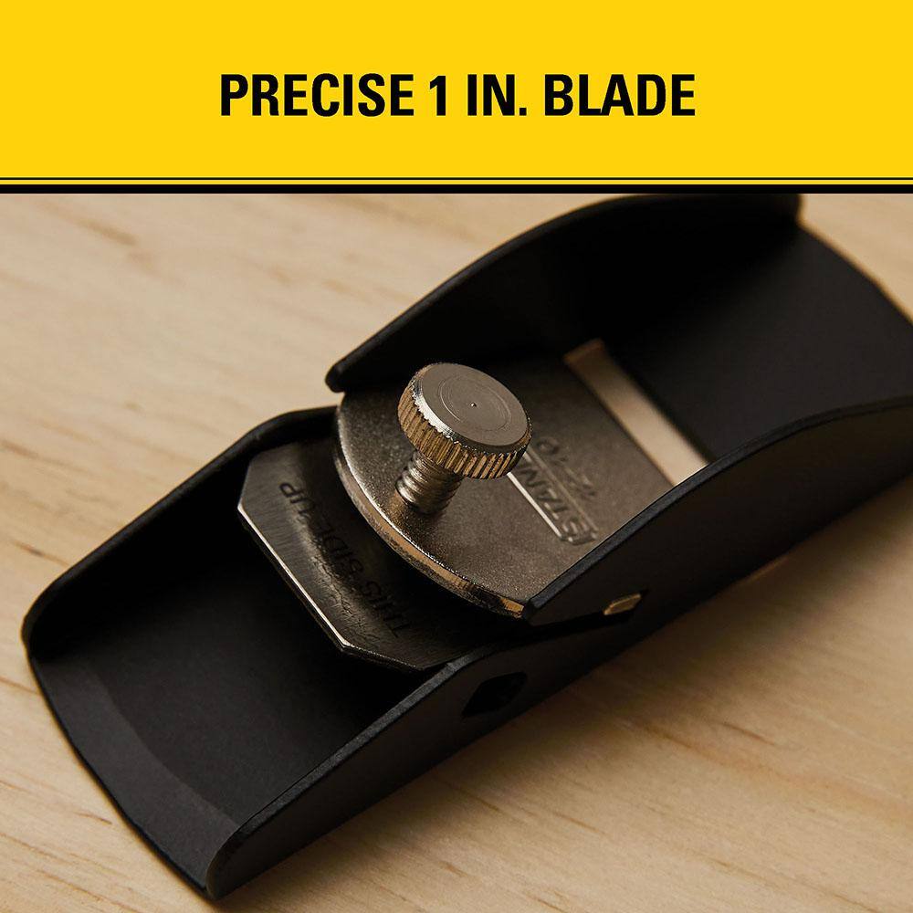 Close up detailed shot of the 1 inch tool steel cutter iron and manual threaded lock screw on the STANLEY 12-101 trimming plane beneath an optimization text banner reading precise 1 inch blade.
