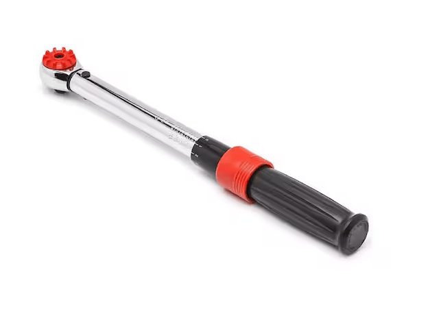 A long-handled torque wrench is shown diagonally against a plain white background. It has a polished chrome metal shaft with a compact ratcheting head at one end. The head features a bright red circular adjustment or control piece. At the opposite end is a long, ribbed black grip designed for a secure hold, with a red adjustment collar positioned just above the handle. The tool has a clean, professional appearance with contrasting chrome, black, and red components.