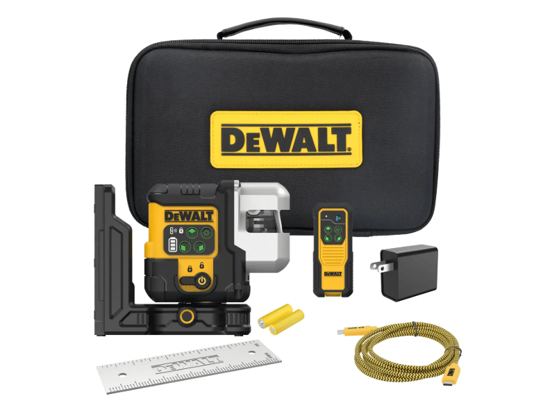This image displays the DEWALT 3-line green laser level kit along with its complete set of accessories arranged on a clean white surface. In the back, a black zippered storage case features a prominent yellow rectangular patch with the DEWALT brand name. In front of the case sits the main black-and-yellow laser unit attached to an adjustable magnetic mounting bracket, a handheld remote control, a power adapter block, two yellow AA batteries, a small metal alignment plate, and a yellow-and-black braided USB-