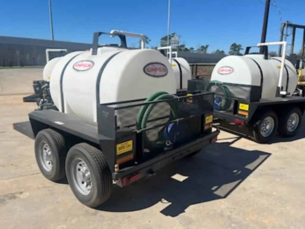 A rear angled view of the Simpson mobile water trailer showcasing the integrated hose storage rack, heavy-duty rear bumper, and the high-capacity water tank designed for industrial dust control and site cleaning.