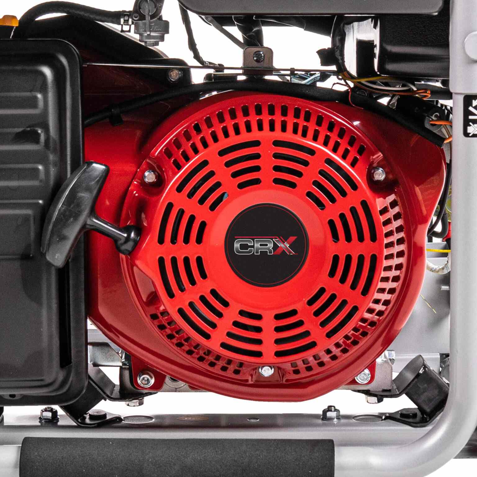 Close-up view of the red CRX engine recoil starter assembly showing the cooling vents, CRX logo, and black pull handle.