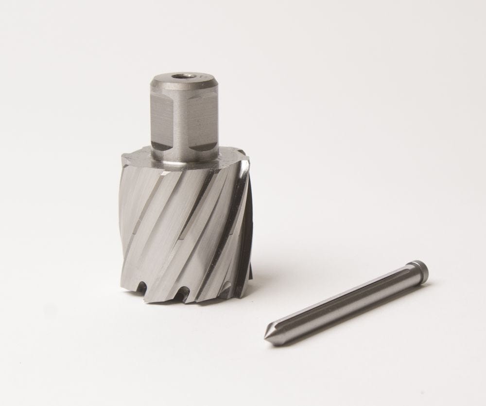 Fein Slugger HSS annular cutter and pilot pin displayed on a white surface. The cutter is cylindrical with sharp helical cutting edges and a central bore, designed for drilling 1-13/16" diameter holes up to 2" deep in metal. The 3/4" Weldon shank includes a flat section for secure mounting in magnetic drill presses. The pilot pin, shown beside the cutter, is slender and pointed, used to guide the cutter and eject the slug during operation. Ideal for precision metalworking and fabrication tasks.