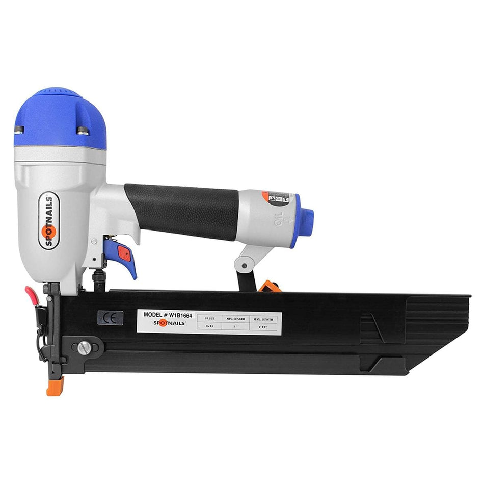 Image of Spotnails 16 Ga Brad Nailer side view. This is a large, grey and black pneumatic nail gun with a blue top, positioned horizontally. The side of the tool features the "SPOTNAILS" logo in white, and a black label with white text showing the "MODEL # W1B1664" and various nail length specifications.