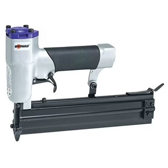 Side view of the SpotNails SP2340 "The Striker" 23-gauge micro pinner, showing the silver body, purple cap, black rubber grip, and slim magazine.