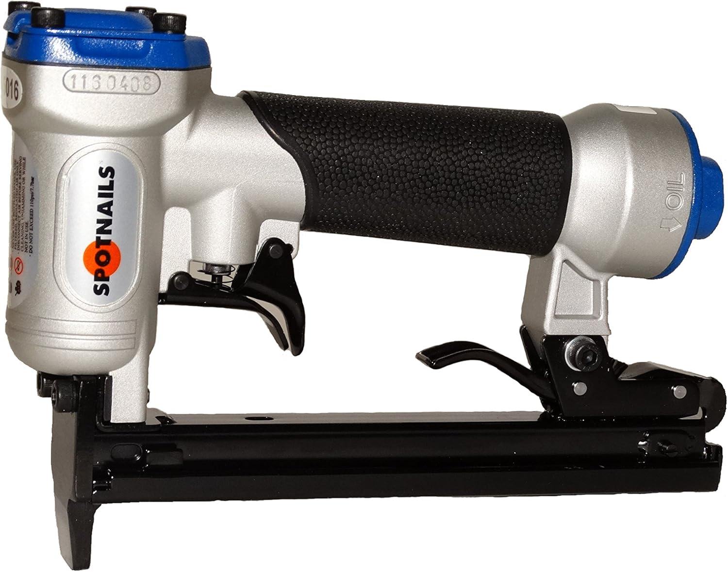 A silver and black Spotnails PSA1116 pneumatic upholstery stapler with a blue exhaust cap, showing the rear-load magazine and rubberized grip.