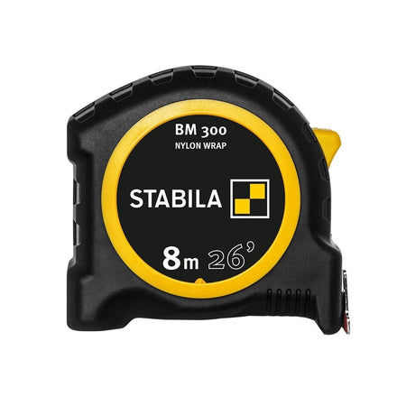 Front view of the Stabila BM 300 tape measure showing the black and yellow casing with the Stabila logo and 8m 26ft capacity label.