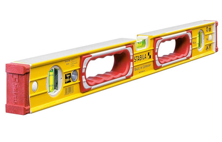 Studio view of the Stabila Type 196-2 24-inch spirit level featuring a yellow ribbed aluminum frame, two red ergonomic hand grips, and three high-visibility vials.
