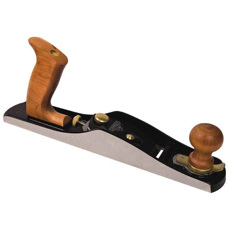 Side profile view of the Stanley low angle jack plane, displaying the long flat sole, the low bedding angle of the iron, and the ergonomic curves of the wooden tote and knob.