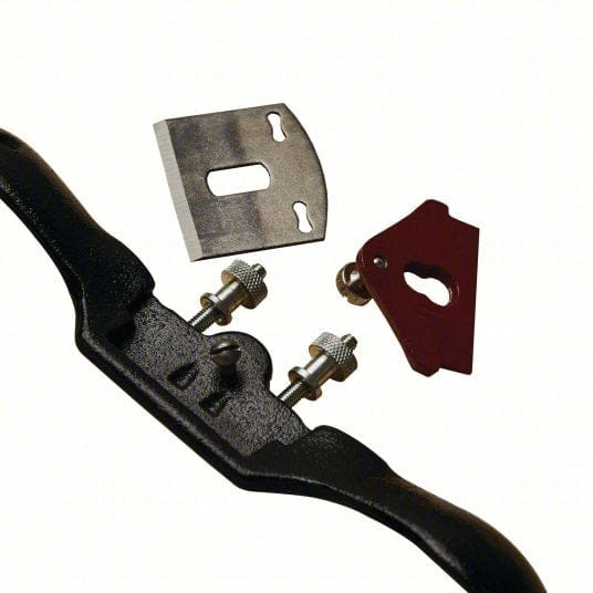 Exploded view showing the tool body, the removed steel blade, and the red lever cap separately to illustrate the internal adjustment posts and bed design.