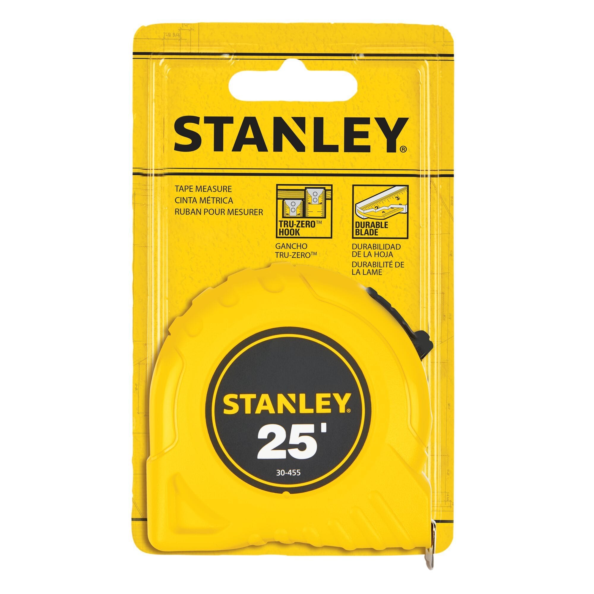 A retail e-commerce packaging view of the Stanley 25-foot tape measure secured in its yellow cardboard blister card display, featuring graphic icons detailing the Tru-Zero hook and durable polymer blade coating.