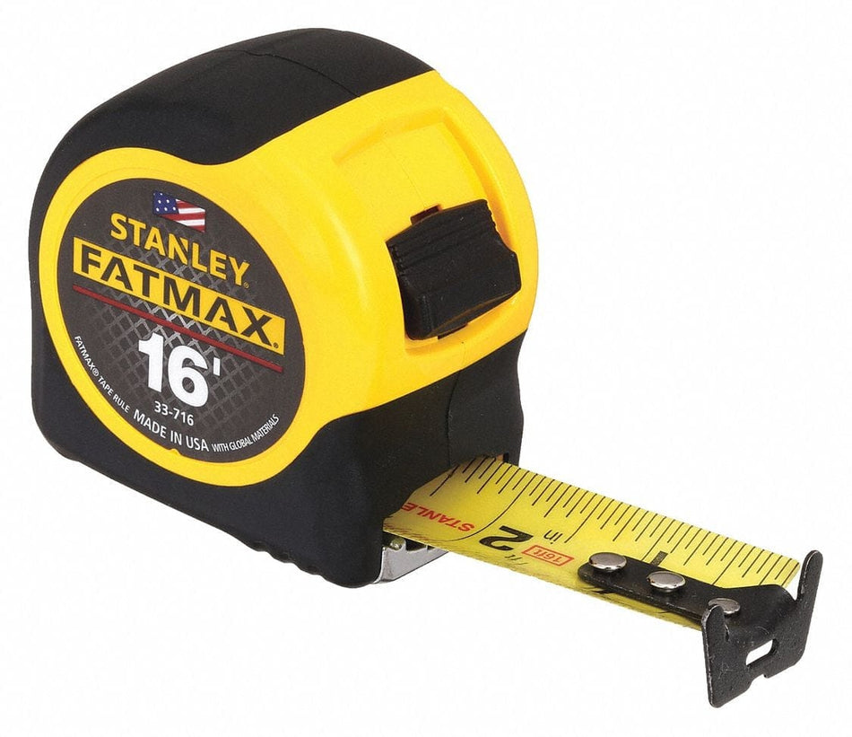 Stanley 33‑716 FatMax 16 ft tape measure shown with its wide 1‑1/4 inch blade extended, featuring BladeArmor coating, high‑impact case, and rubber grip; close‑up product image highlighting durability and professional‑grade framing performance.
