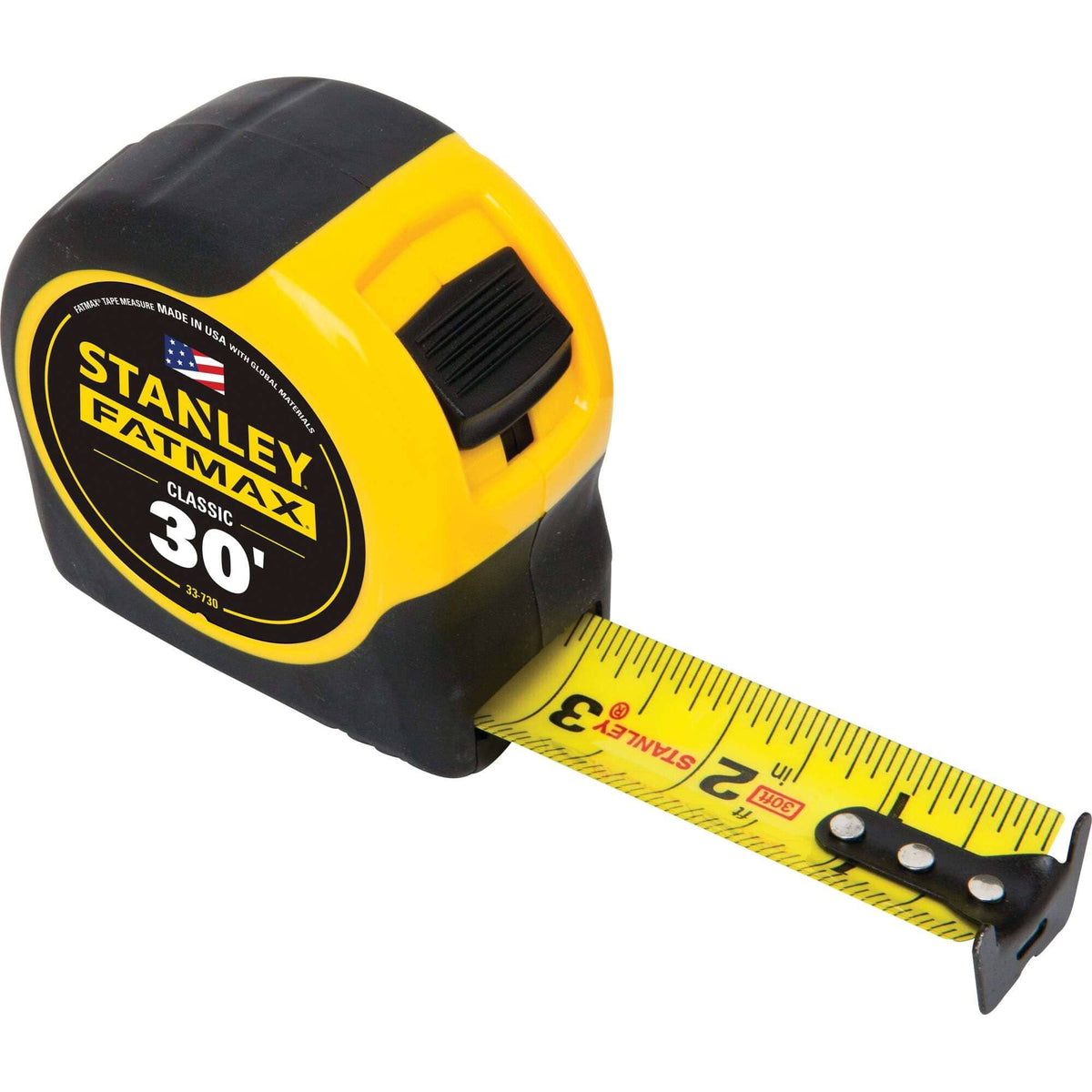 A perspective studio shot of the Stanley 33-730 30 ft FATMAX Classic tape measure, featuring the high-impact yellow and black case with the 1-1/4 inch wide steel blade extended to show large markings and the multi-catch hook.