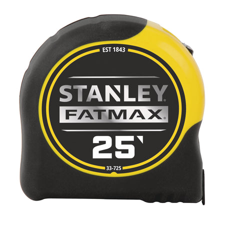 A direct side-profile studio photograph of the closed yellow and black Stanley FatMax 25-foot tape measure, showcasing the iconic round emblem with full model branding, 33-725 configuration number, and the textured black rubber armor casing against a pure white background.