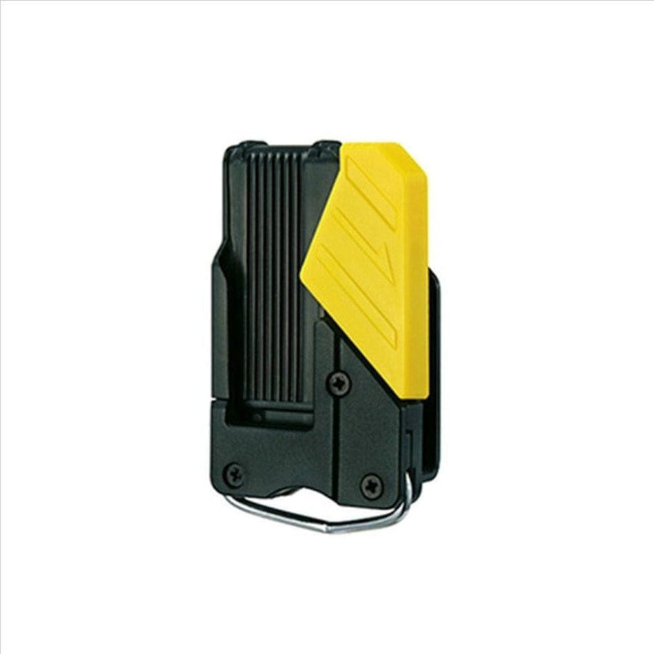 This is the Tajima SF-BHLD Safety Holder for Measuring Tape.

We can clearly see the black and yellow design, the clip mechanism, and the ring at the bottom where the safety rope (AZS-ROP) would attach. This holder is designed to securely keep your Tajima measuring tape accessible on your belt while also providing a point for tethering it, which is a smart safety feature .