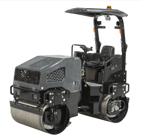 A professional angled view of the RA29Y tandem roller highlighting the 43.5 HP Yanmar diesel engine compartment, folding ROPS safety frame, and high-visibility LED work lights.