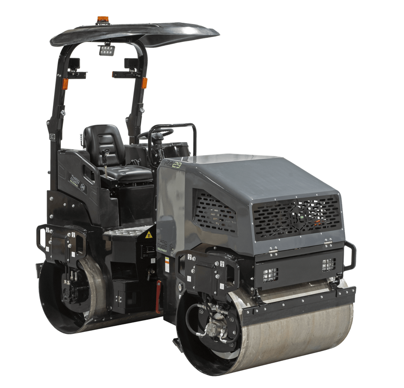 The opposite angled studio shot of the RA29Y vibratory roller showcasing the ergonomic operator station, sliding adjustable seat, and the robust dual-drum drive system designed for 8,540 lbf of compaction force.