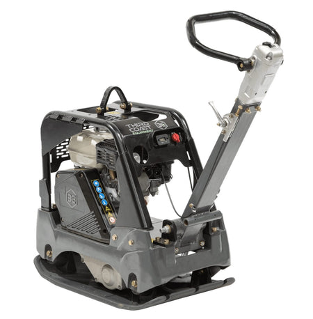 An angled studio shot of the RP350 reversible plate compactor from the engine side, showcasing the protective shielding and the industrial-grade components designed for heavy-duty paving and earthwork.