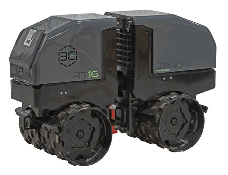 A front angled studio shot of the 4,035 lb remote-controlled compactor emphasizing the heavy-duty steel hood protection and the integrated lifting points for easy placement into deep excavations.